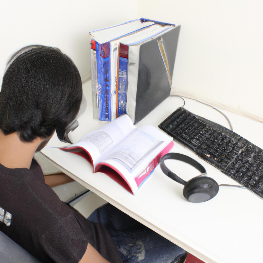 Person studying computer science material